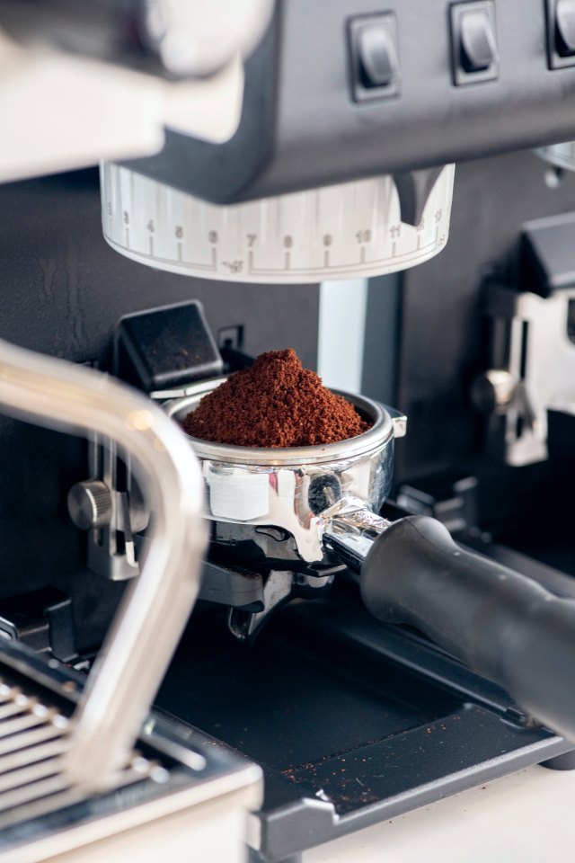 Freshly ground coffee in the portafilter